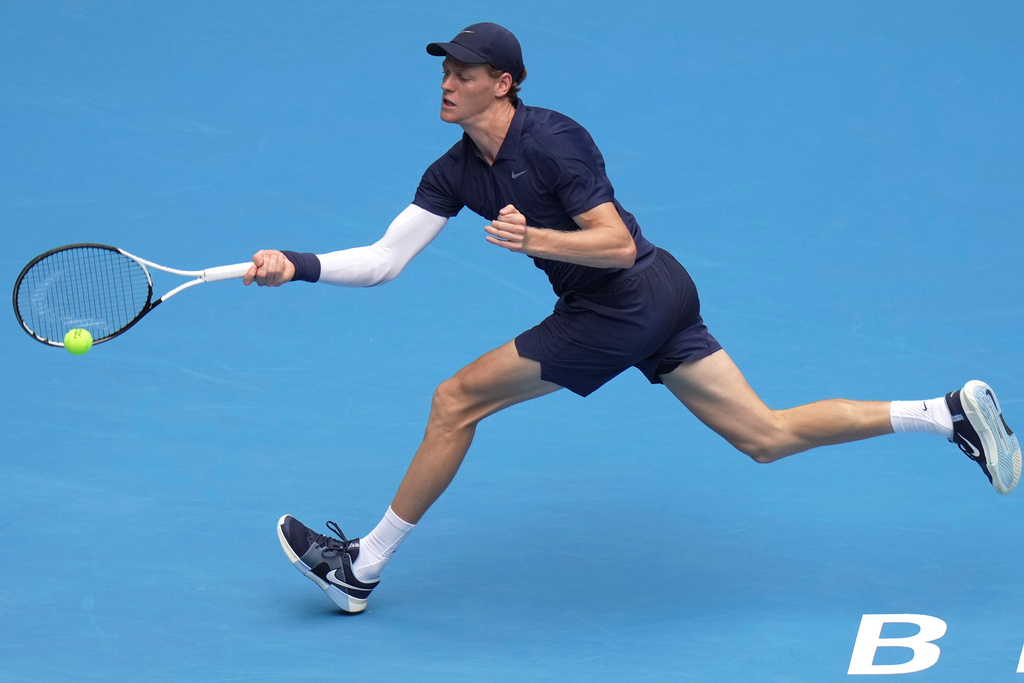Jannik Sinner of Italy returns a shot from Learner Tien of the United States in the men's singles final match for the China Open tennis tournament in Beijing on Wednesday, Oct. 1, 2025. (AP Photo/Andy Wong)