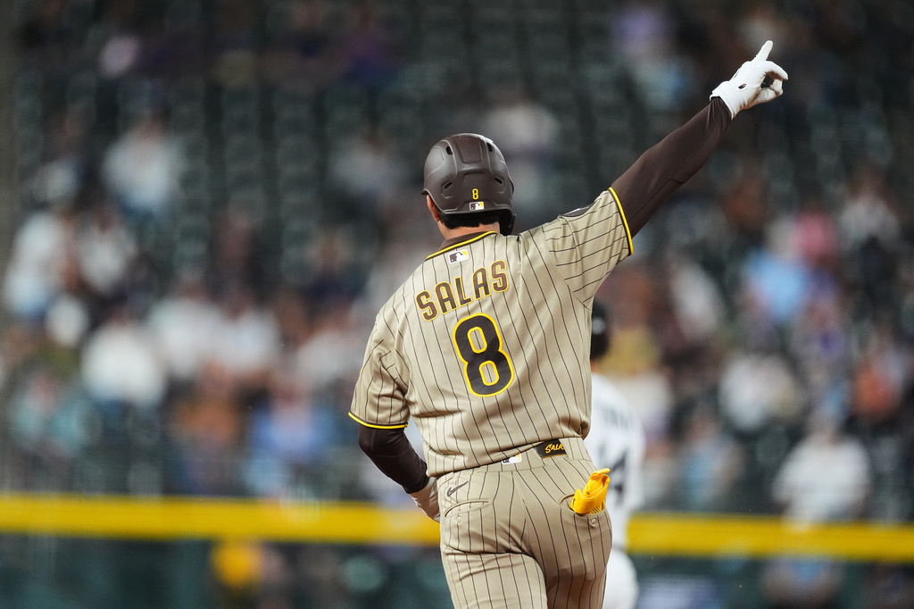 San Diego Padres' Ethan Salas gestures to the bullpen as he circles the bases after hitting a two-run home run off Colorado Rockies relief pitcher Nick Frasso in the fifth inning of a baseball game Wednesday, Sept. 16, 2026, in Denver. (AP Photo/David Zalubowski)wld