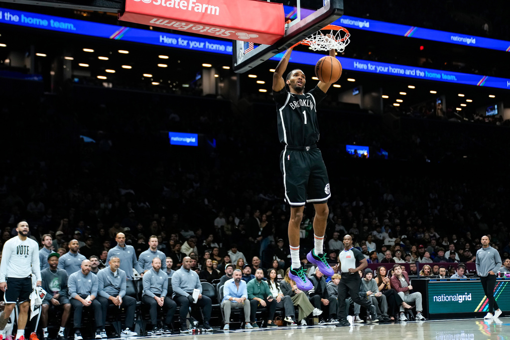 Brooklyn Nets' Ziaire Williams (1) dunks against the Philadelphia 76ers during the first half of an NBA basketball game Sunday, Nov. 2, 2025, in New York. (AP Photo/Eduardo Munoz Alvarez)