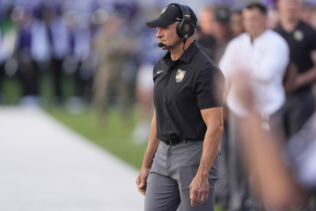 Army head coach Jeff Monken watched during the first half of an NCAA college football gameagainst Kansas State, Saturday, Sept. 6, 2025, in Manhattan, Kan. (AP Photo/Charlie Riedel)