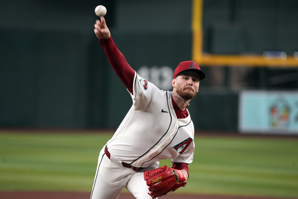 Arizona Diamondbacks pitcher Ryne Nelson throws against the Atlanta Braves in the first inning of a baseball game, Thursday, April 2, 2026, in Phoenix. (AP Photo/Rick Scuteri)
