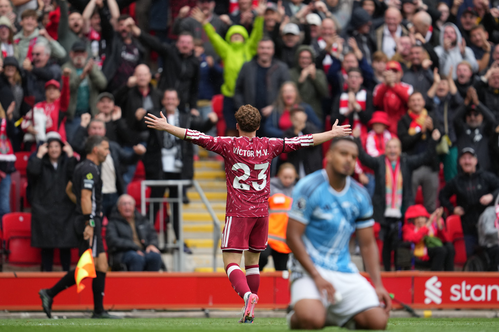 Liverpool's Victor Munoz celebrates after scoring his side's second goal during the English Premier League soccer match between Liverpool and Nottingham Forest in Liverpool, England, Saturday, Aug. 29, 2026. (AP Photo/Jon Super)