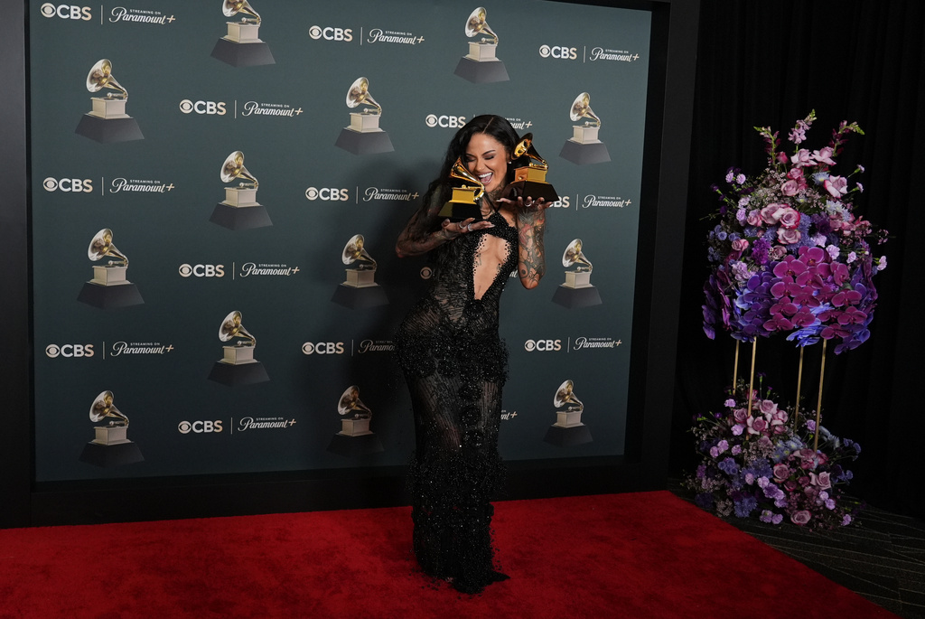Kehlani poses in the press room with the awards for best R&B performance and best R&B song for "Folded" during the 68th annual Grammy Awards on Sunday, Feb. 1, 2026, in Los Angeles. (Photo by Richard Shotwell/Invision/AP)
