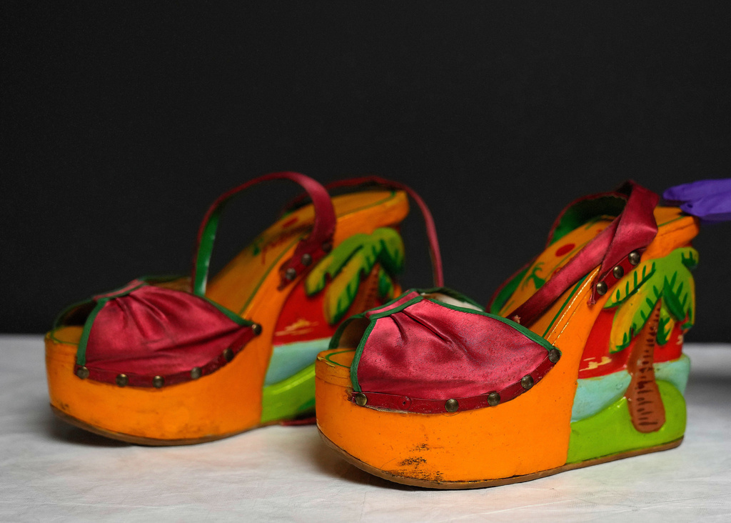 A pair of shoes wore by David Bowie on Ziggy Stardust in 1972 are on display during a press preview at the David Bowie Centre, a new archive at the V&A East Storehouse in London, Wednesday, Sept. 10, 2025, ahead of its public opening on Saturday. (AP Photo/Joanna Chan)
