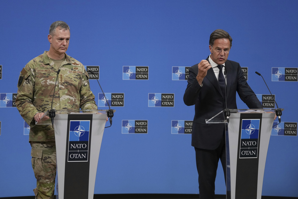 NATO Secretary General Mark Rutte, right, and Supreme Allied Commander Europe (SACEUR), General Alexus G. Grynkewich address the media at NATO headquarters in Brussels, Friday, Sept. 12, 2025. (AP Photo/Virginia Mayo)