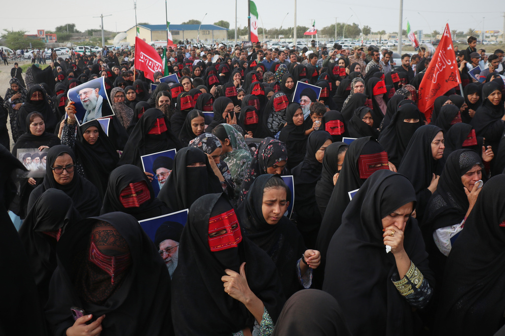 Mourners take part in the funeral procession for people killed when, according to Iranian media and a rights group, a U.S. missile struck a home where a wedding was being held in Kuhestak, southern Iran, Thursday, Sept. 3, 2026. (Razieh Poudat/ISNA via AP)
