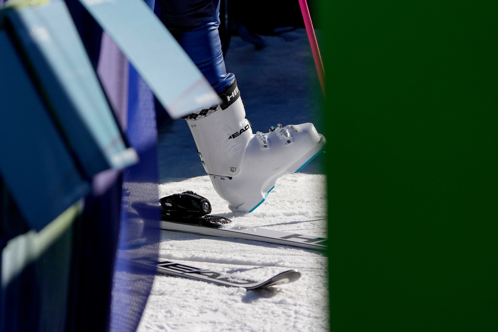 A view of a ski boot of Sweden's Sara Hector at the finish area of an alpine ski, women's giant slalom race, at the 2026 Winter Olympics, in Cortina d'Ampezzo, Italy, Sunday, Feb. 15, 2026. (AP Photo/Andy Wong)