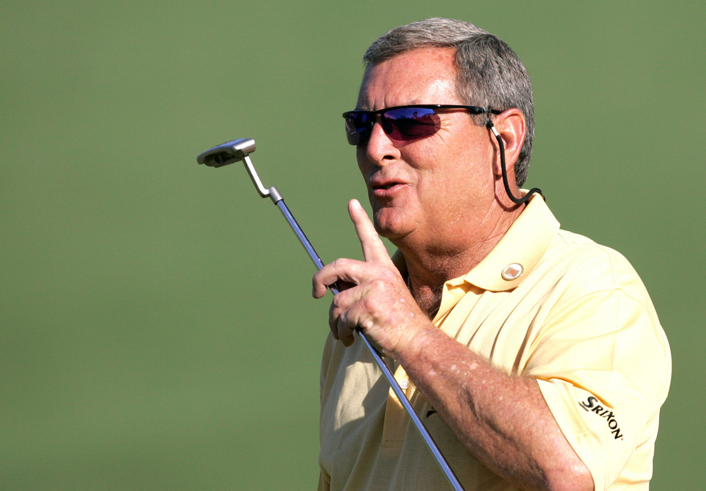 FILE - In this April 6, 2006, file photo, Fuzzy Zoeller encourages the crowd to be quiet on the second hole during first round play at the Masters golf tournament at the Augusta National Golf Club in Augusta, Ga. (AP Photo/Morry Gash, File)