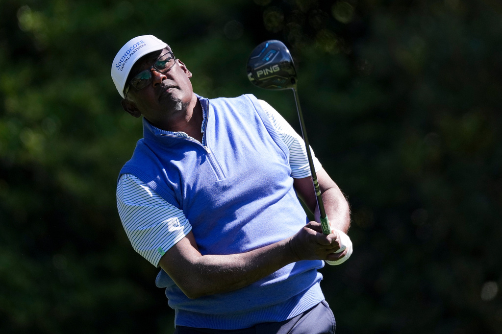 FILE - Vijay Singh, of Fiji, watches his tee shot on the 11th hole during the first round of the Masters golf tournament at the Augusta National Golf Club, April 9, 2026, in Augusta, Ga. (AP Photo/Matt Slocum, File)