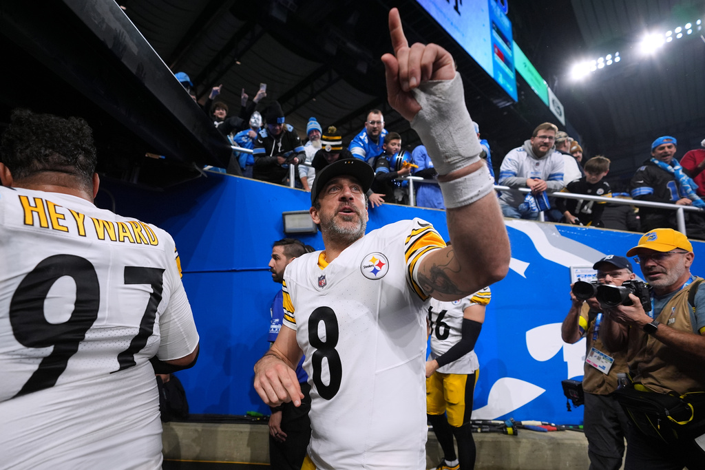 Pittsburgh Steelers' Aaron Rodgers reacts after Pittsburgh won an NFL football game against the Detroit Lions, Sunday, Dec. 21, 2025, in Detroit. (AP Photo/Ryan Sun)