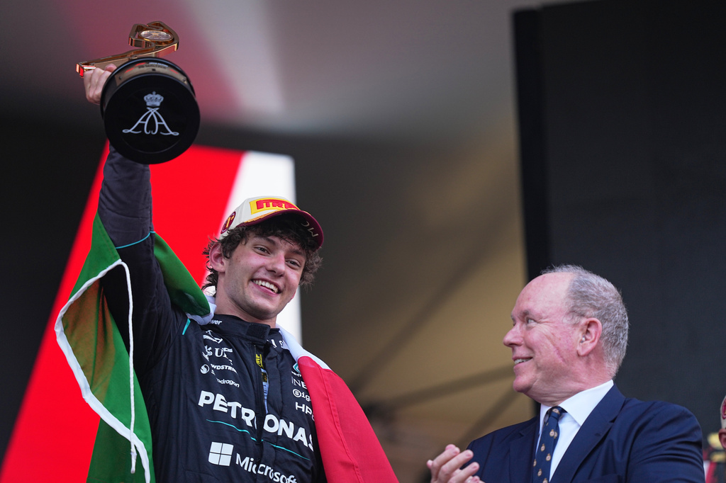 Mercedes driver Andrea Kimi Antonelli, of Italy, celebrates on the podium after winning the Formula One Monaco Grand Prix race at the Monaco racetrack, Sunday, June 7, 2026. (AP Photo/Fatima Shbair)