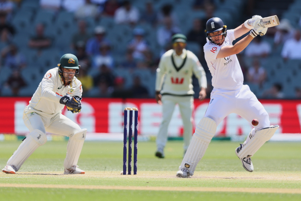 England's Jamie Smith bats during play on the final day of the third Ashes cricket test between England and Australia in Adelaide, Australia, Sunday, Dec. 21, 2025. (AP Photo/James Elsby)