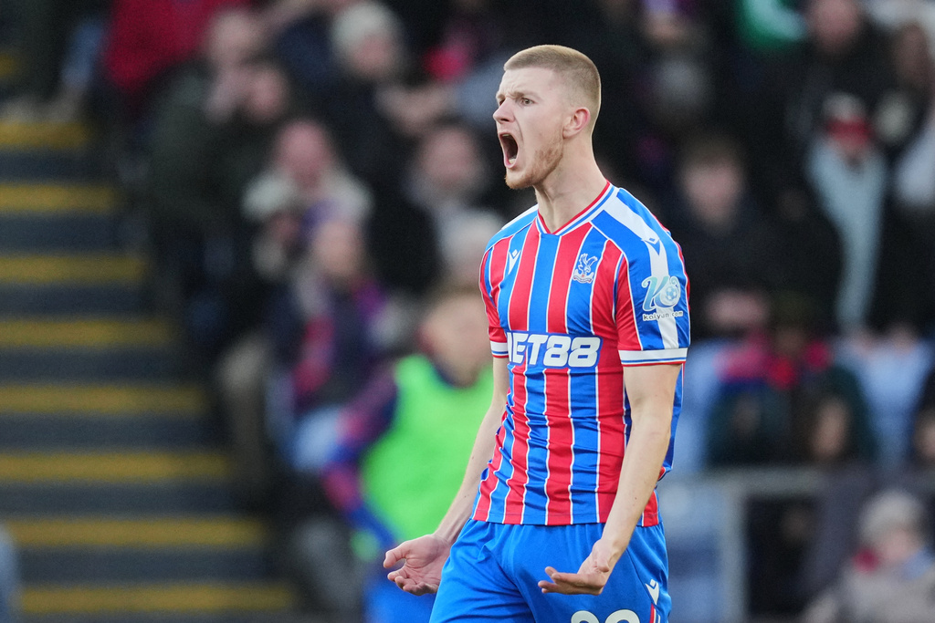 Crystal Palace's Adam Wharton reacts after missing a scoring chance during the English Premier League soccer match between Crystal Palace and Manchester City in London, Sunday, Dec.14, 2025. (AP Photo/Kin Cheung)