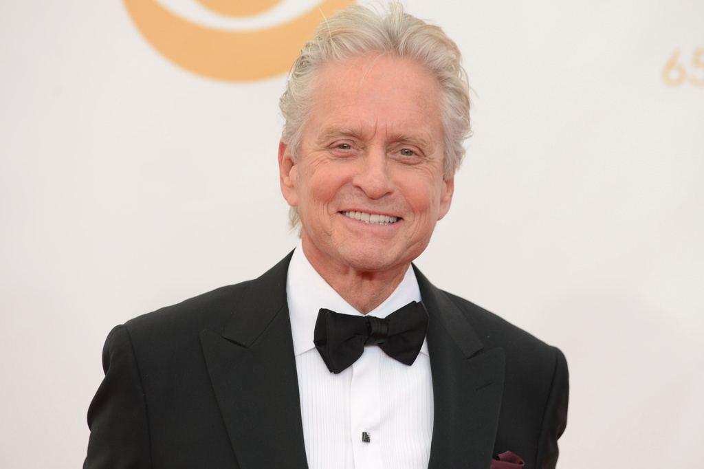 FILE - Michael Douglas appears at the 65th Primetime Emmy Awards in Los Angeles on Sept. 22, 2013. (Photo by Jordan Strauss/Invision/AP, File)