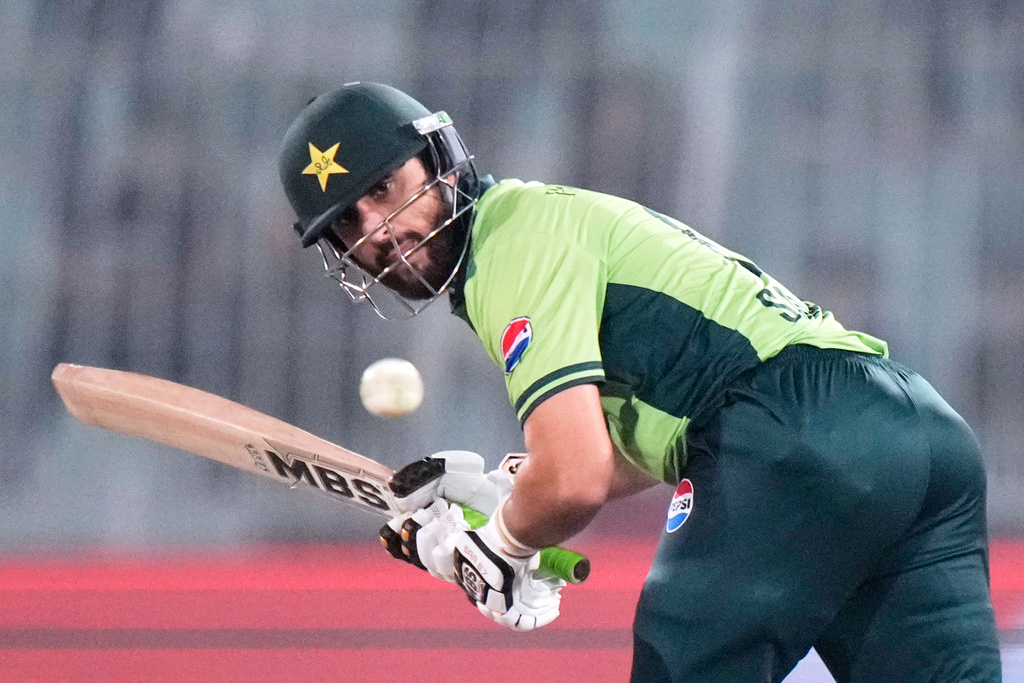 Pakistan's Salman Ali Agha plays a shot during the first one day international cricket match between Pakistan and South Africa, in Faisalabad, Pakistan, Tuesday, Nov. 4, 2025. (AP Photo/Anjum Naveed)
