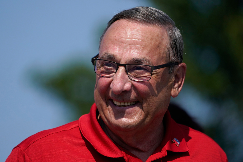 FILE - Former Gov. Paul LePage, a Republican gubernatorial candidate, marches in the State of Maine Bicentennial Parade, Aug. 21, 2021, in Lewiston, Maine. (AP Photo/Robert F. Bukaty, File)
