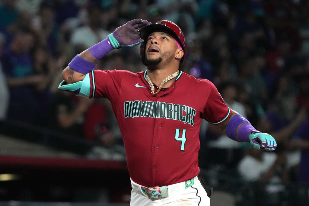 Arizona Diamondbacks' Ketel Marte reacts after hitting a solo home run against the Colorado Rockies in the fourth inning of a baseball game, Saturday, May 23, 2026, in Phoenix. (AP Photo/Rick Scuteri)
