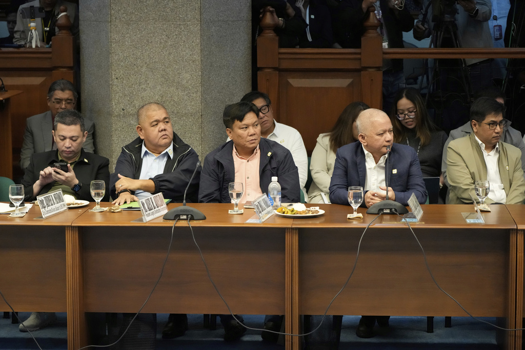 Private contractors listen as they attend investigations on flood-control projects at the Senate Blue Ribbon committee in Pasay city, Philippines on Monday, Sept. 8, 2025. (AP Photo/Aaron Favila)
