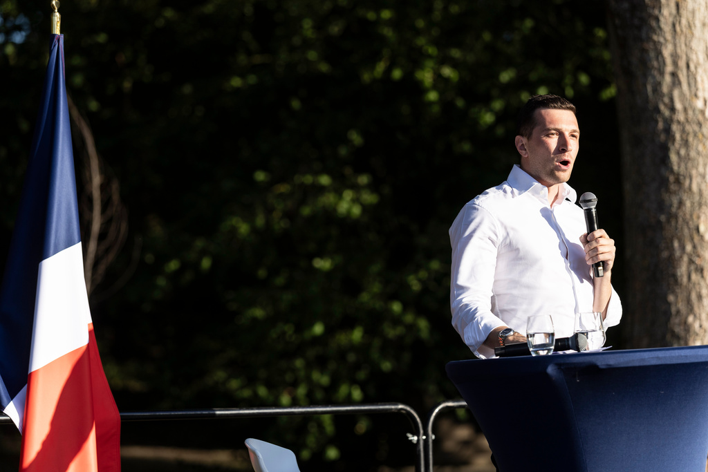 Far-right party National Rally president Jordan Bardella speaks during a rally in Lievin, northern France, Saturday, July 4, 2026. (AP Photo/Jean-Francois Badias)