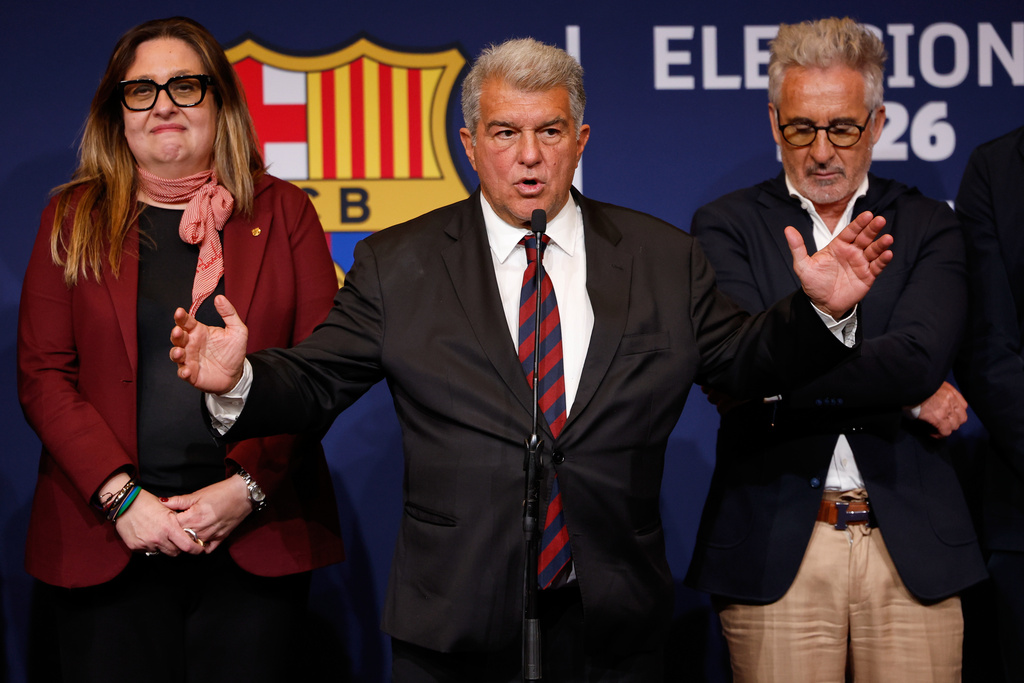Joan Laporta gestures as he speaks after being elected president of FC Barcelona following the soccer club's presidential election in Barcelona, Spain, early Monday, March 16, 2026. (AP Photo/Joan Monfort)