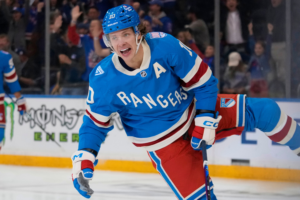 New York Rangers' Artemi Panarin (10) celebrates after scoring a goal during the first period of an NHL hockey game against the Minnesota Wild Monday, Oct. 20, 2025, at Madison Square Garden in New York. (AP Photo/Frank Franklin II)