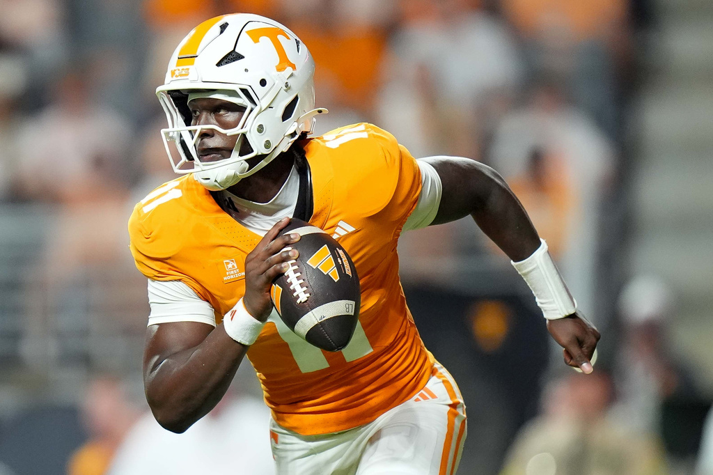 Tennessee quarterback Faizon Brandon runs the ball during the first half of an NCAA college football game against Kennesaw State, Saturday, Sept. 19, 2026, in Knoxville, Tenn. (AP Photo/Camden Hall)