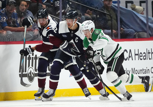 Dallas Stars center Wyatt Johnston, right, pursues the puck with Colorado Avalanche left wing Gabriel Landeskog, center, and right wing Valeri Nichushkin in the second period of an NHL hockey game against the Dallas Stars, Saturday, Oct. 11, 2025, in Denver. (AP Photo/David Zalubowski) Dallas Stars center Wyatt Johnston, right, pursues the puck with Colorado Avalanche left wing Gabriel Landeskog, center, and right wing Valeri Nichushkin in the second period of an NHL hockey game against the Dallas Stars, Saturday, Oct. 11, 2025, in Denver. (AP Photo/David Zalubowski)