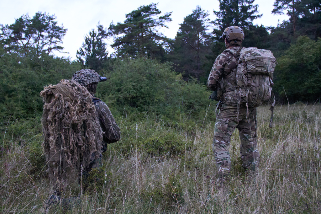US special forces patrol during a joint military exercise with forces from Poland at the Joint Multinational Readiness Center in Hohenfels near Nuernberg, Germany, Friday, Aug. 28, 2026. (AP Photo/Konstantin Toropin)