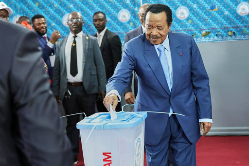 President Paul Biya casts his ballot at the Government Bilingual primary school Bastos in Yaounde, Cameroon, Saturday, Oct. 12, 2025 (AP Photo/Angel Ngwe) President Paul Biya casts his ballot at the Government Bilingual primary school Bastos in Yaounde, Cameroon, Saturday, Oct. 12, 2025 (AP Photo/Angel Ngwe)