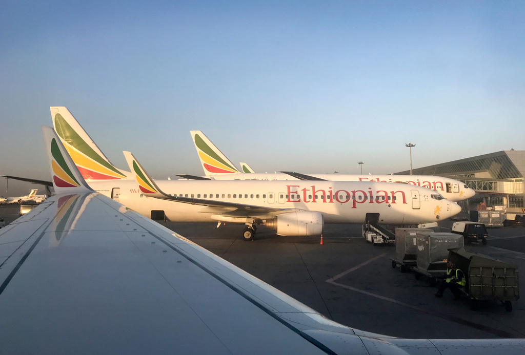 FILE - Ethiopian Airlines planes are parked at Bole International Airport in Addis Ababa, Ethiopia, Monday Feb. 11, 2019. (AP Photo/Ben Curtis, File)