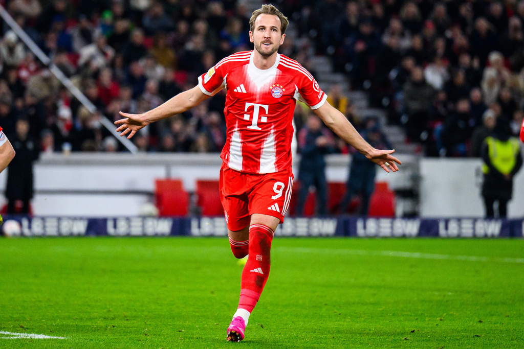 Munich's Harry Kane celebrates after scoring his side's fourth goal during the German Bundesliga soccer match between VfB Stuttgart and FC Bayern Munich in Stuttgart, Germany, Saturday, Dec. 6, 2025. (Tom Weller/dpa via AP)