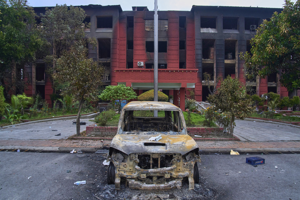 Nepal Health Ministry building is seen vandalized in Kathmandu, Nepal, Wednesday, Sept.10, 2025. (AP Photo/Niranjan Shrestha)