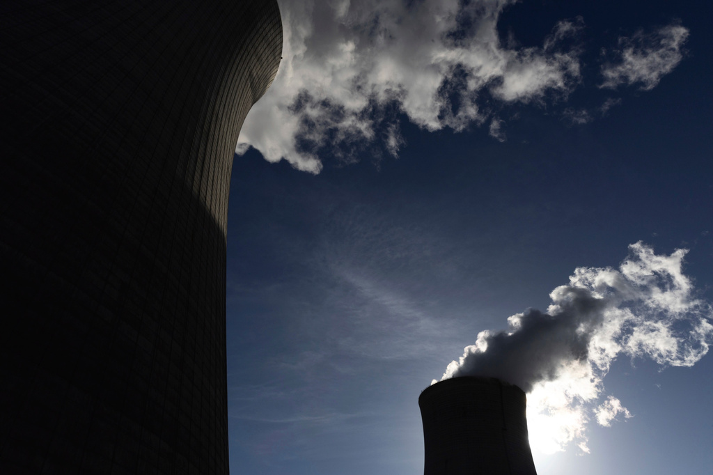 FILE - The cooling towers for units 4, left, and 3, right, are seen at Plant Vogtle, operated by Georgia Power Co., in east Georgia's Burke County near Waynesboro, Ga., on May 29, 2024. (Arvin Temkar/Atlanta Journal-Constitution via AP, File)