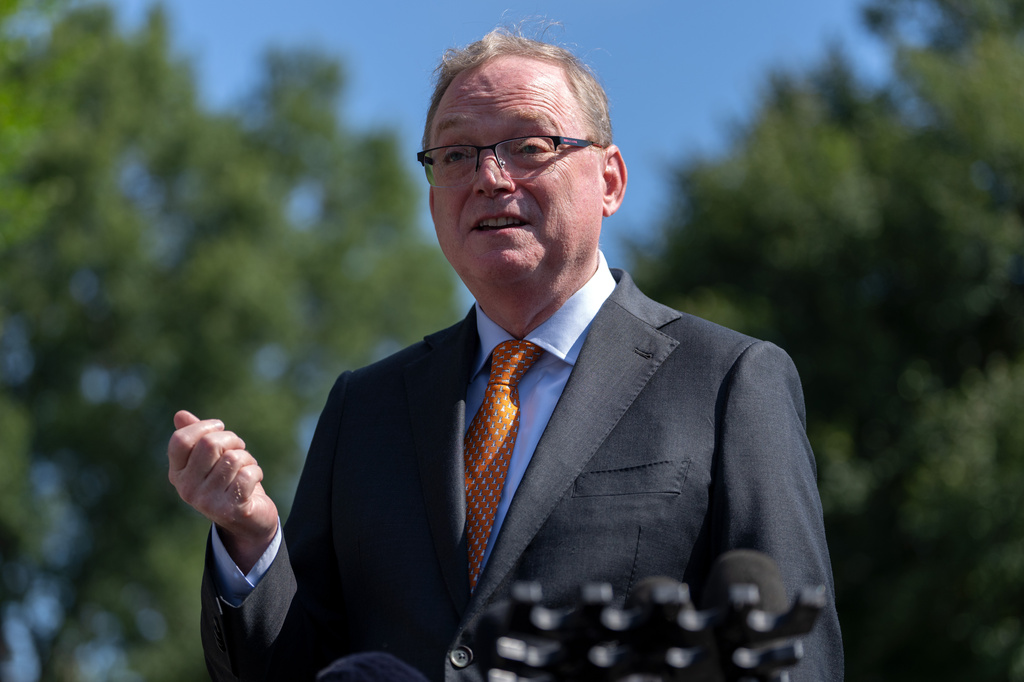 Kevin Hassett, director of the White House National Economic Council, speaks to reporters outside the White House, Friday, Aug. 7, 2026, in Washington. (AP Photo/Mark Schiefelbein)