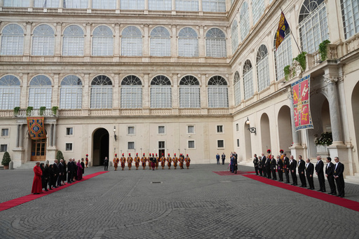 Britain's King Charles III and Queen Camilla listen national anthems in the St. Damasus Courtyard at the Vatican for a state visit, where they will meet with Pope Leo XIV and pray with him in the Sistine Chapel, Thursday, Oct. 23, 2025. (AP Photo/Andrew Medichini) Britain's King Charles III and Queen Camilla listen national anthems in the St. Damasus Courtyard at the Vatican for a state visit, where they will meet with Pope Leo XIV and pray with him in the Sistine Chapel, Thursday, Oct. 23, 2025. (AP Photo/Andrew Medichini)