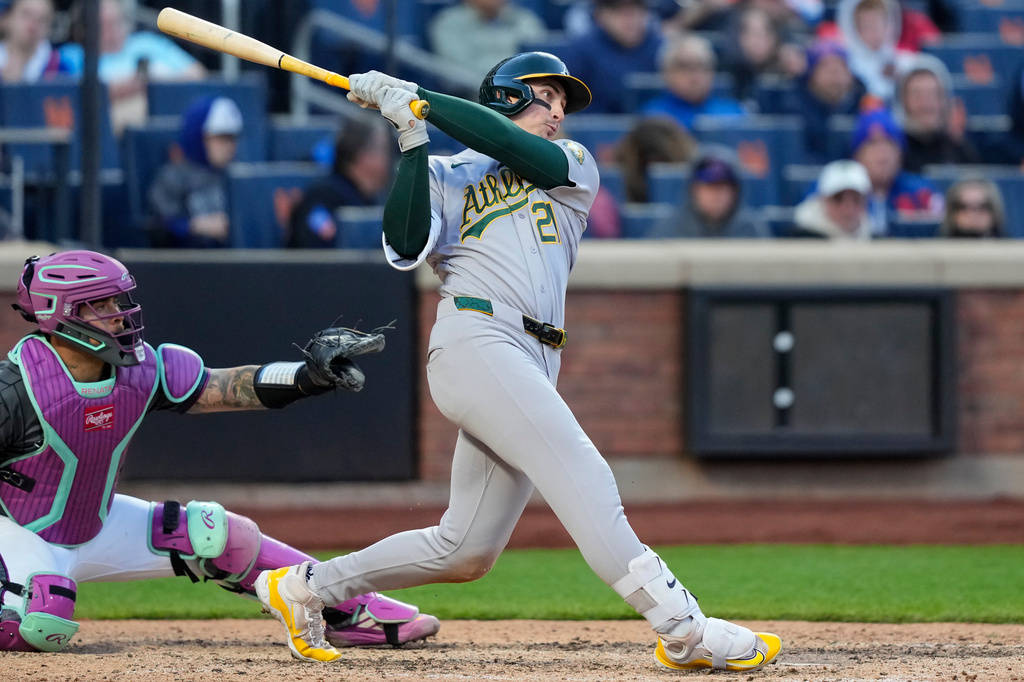 Athletics' Tyler Soderstrom (21) hits a three-run home run during the eighth inning of a baseball game against the New York Mets, Saturday, April 11, 2026, in New York. (AP Photo/Yuki Iwamura)