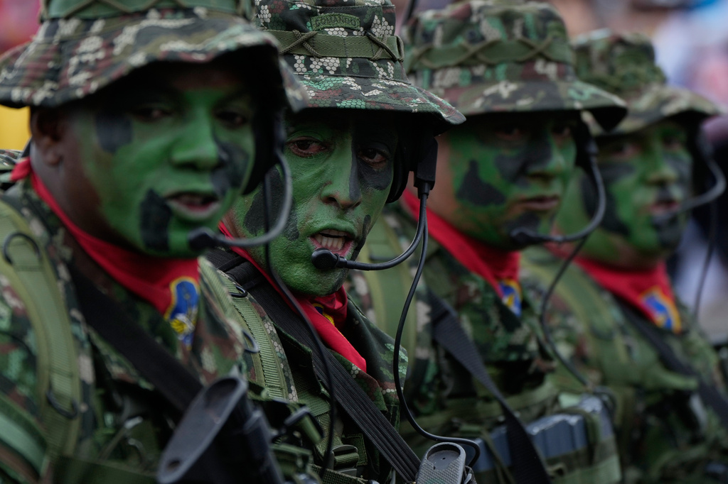 Soldier march during a parade marking Independence Day in Bogota, Colombia, Monday, July 20, 2026. (AP Photo/Fernando Vergara)