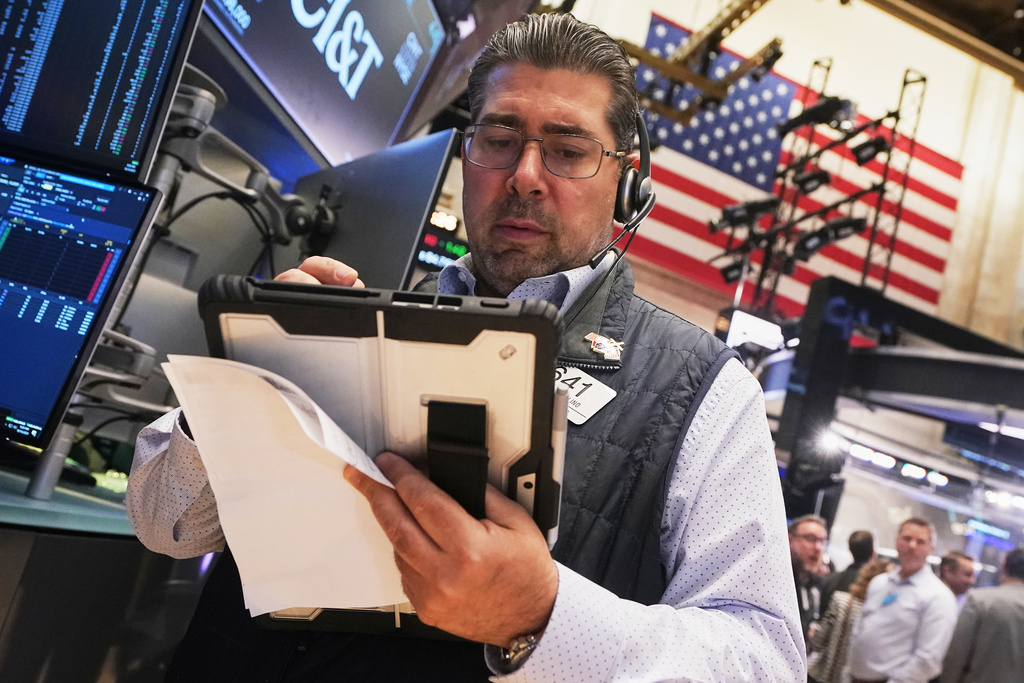 Trader Michael Capolino works on the floor of the New York Stock Exchange, Wednesday, Oct. 15, 2025. (AP Photo/Richard Drew)