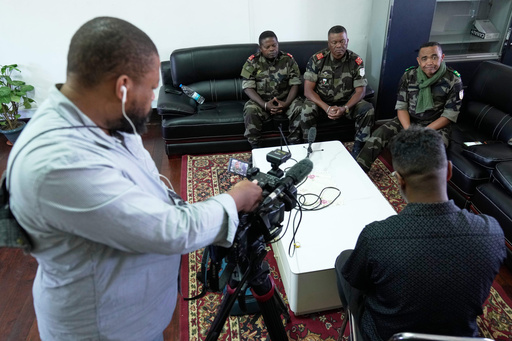 CAPSAT military unit commander Col. Michael Randrianirina, right, speaks during an interview with the Associated Press at the CAPSAT military barracks in Antananarivo, Madagascar, Wednesday, Oct. 15, 2025. (AP Photo/Brian Inganga) CAPSAT military unit commander Col. Michael Randrianirina, right, speaks during an interview with the Associated Press at the CAPSAT military barracks in Antananarivo, Madagascar, Wednesday, Oct. 15, 2025. (AP Photo/Brian Inganga)
