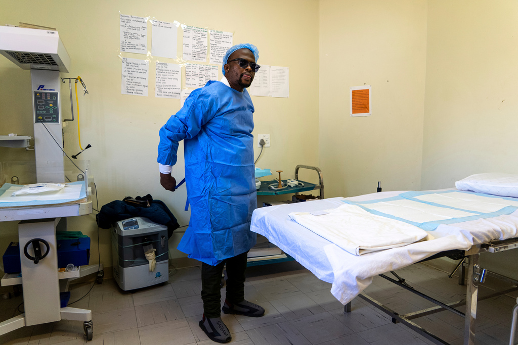 Male midwife Sehloho Ntlhane prepares for prenatal appointments at Mpharane Health Centre in Mohale's Hoek district, Lesotho, Friday, July 10, 2026. (AP Photo/Kayleen Morgan)