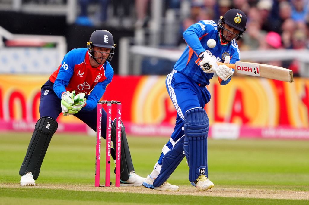 India's Abhishek Sharma bats with England wicketkeeper Jos Buttler during the first IT20 cricket match at Chester-le-Street, England, Wednesday July 1, 2026. (Owen Humphreys/PA via AP)