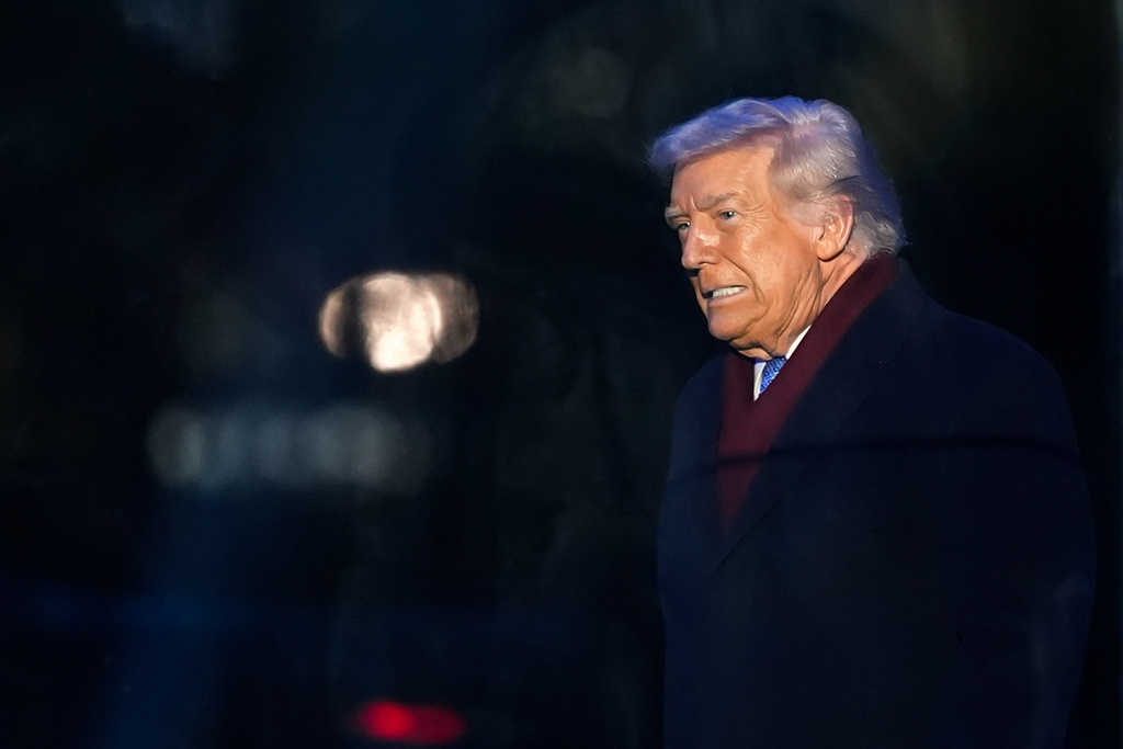 President Donald Trump arrives for the lighting of the National Christmas Tree on the Ellipse, Thursday, Dec. 4, 2025, near the White House in Washington. (AP Photo/Julia Demaree Nikhinson)