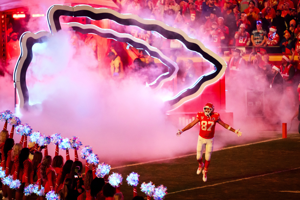 FILE - Kansas City Chiefs tight end Travis Kelce comes onto the field during introductions before an NFL football game against the Denver Broncos, Dec. 25, 2025, in Kansas City, Mo. (AP Photo/Reed Hoffmann, File)
