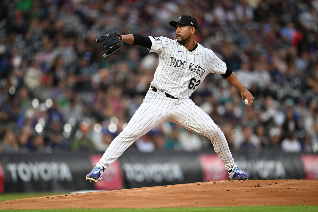 Colorado Rockies starting pitcher Jose Quintana works against the Seattle Mariners during the first inning of a baseball game Saturday, Sept. 19, 2026, in Denver. (AP Photo/RJ Sangosti)