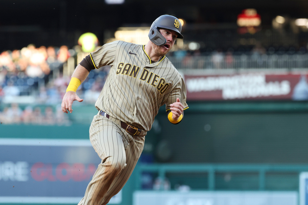San Diego Padres' Gavin Sheets runs to score on a single hit by Manny Machado off Washington Nationals pitcher Andrew Alvarez during the third inning of a baseball game, Friday, May 29, 2026, in Washington. (AP Photo/Terrance Williams)