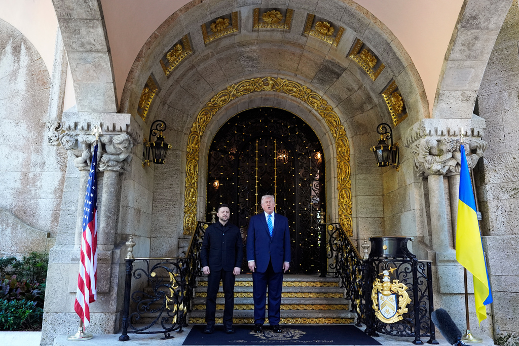 President Donald Trump greets Ukraine's President Volodymyr Zelenskyy at his Mar-a-Lago club, Sunday, Dec. 28, 2025, in Palm Beach, Fla. (AP Photo/Alex Brandon)