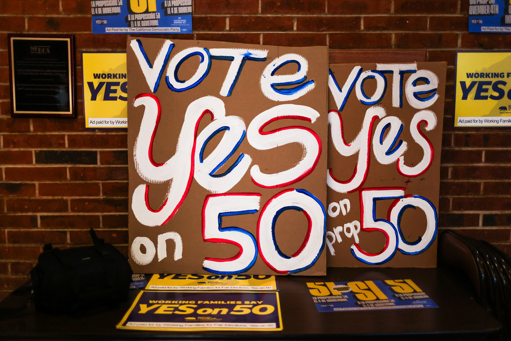 Posters at the IBEW Local 6 headquarters ahead of a campaign event in support of Proposition 50 in San Francisco, Monday, Nov. 3, 2025. (Gabrielle Lurie/San Francisco Chronicle via AP)
