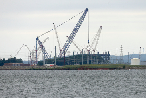FILE - V.C. Summer Nuclear Station's unit two is shown under construction near Jenkinsville, S.C., during a media tour of the facility Wednesday, Sept. 21, 2016. (AP Photo/Chuck Burton) FILE - V.C. Summer Nuclear Station's unit two is shown under construction near Jenkinsville, S.C., during a media tour of the facility Wednesday, Sept. 21, 2016. (AP Photo/Chuck Burton)
