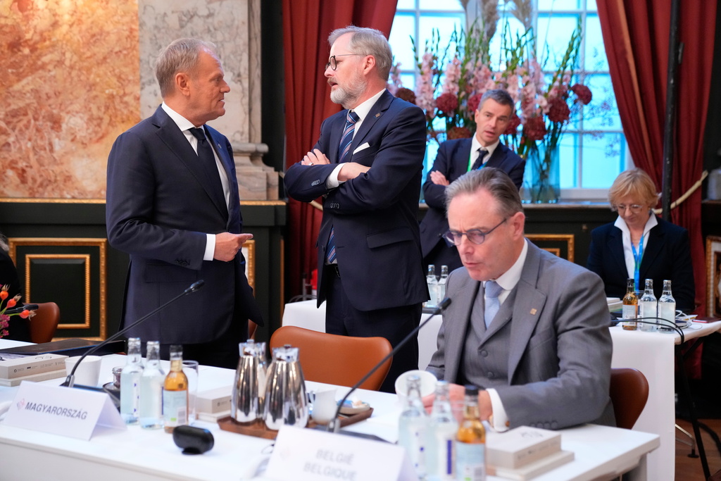 Poland's Prime Minister Donald Tusk, from left, Czech Prime Minister, Petr Fiala and Belgium's Prime Minister Bart De Wever prior to an informal summit in the Danish parliament at Christiansborg Castle in Copenhagen, on Wednesday, Oct. 1, 2025. (Ida Marie Odgaard/Ritzau Scanpix via AP)