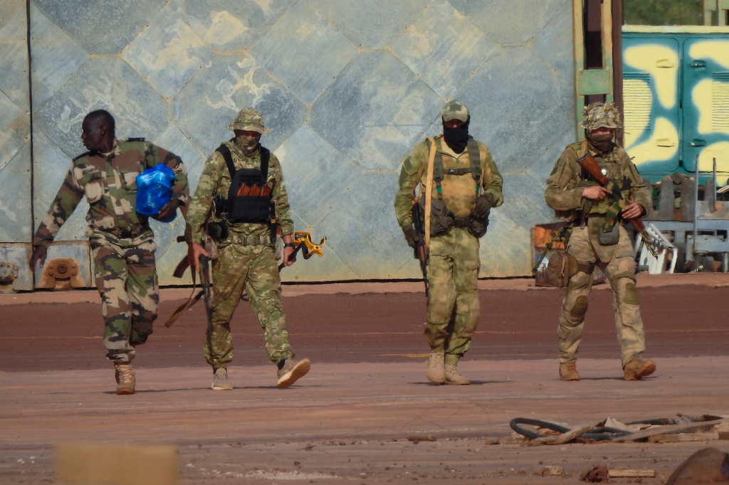 FILE - This undated photograph handed out by the French military shows three Russian mercenaries, right, in northern Mali. (French Army via AP, File)